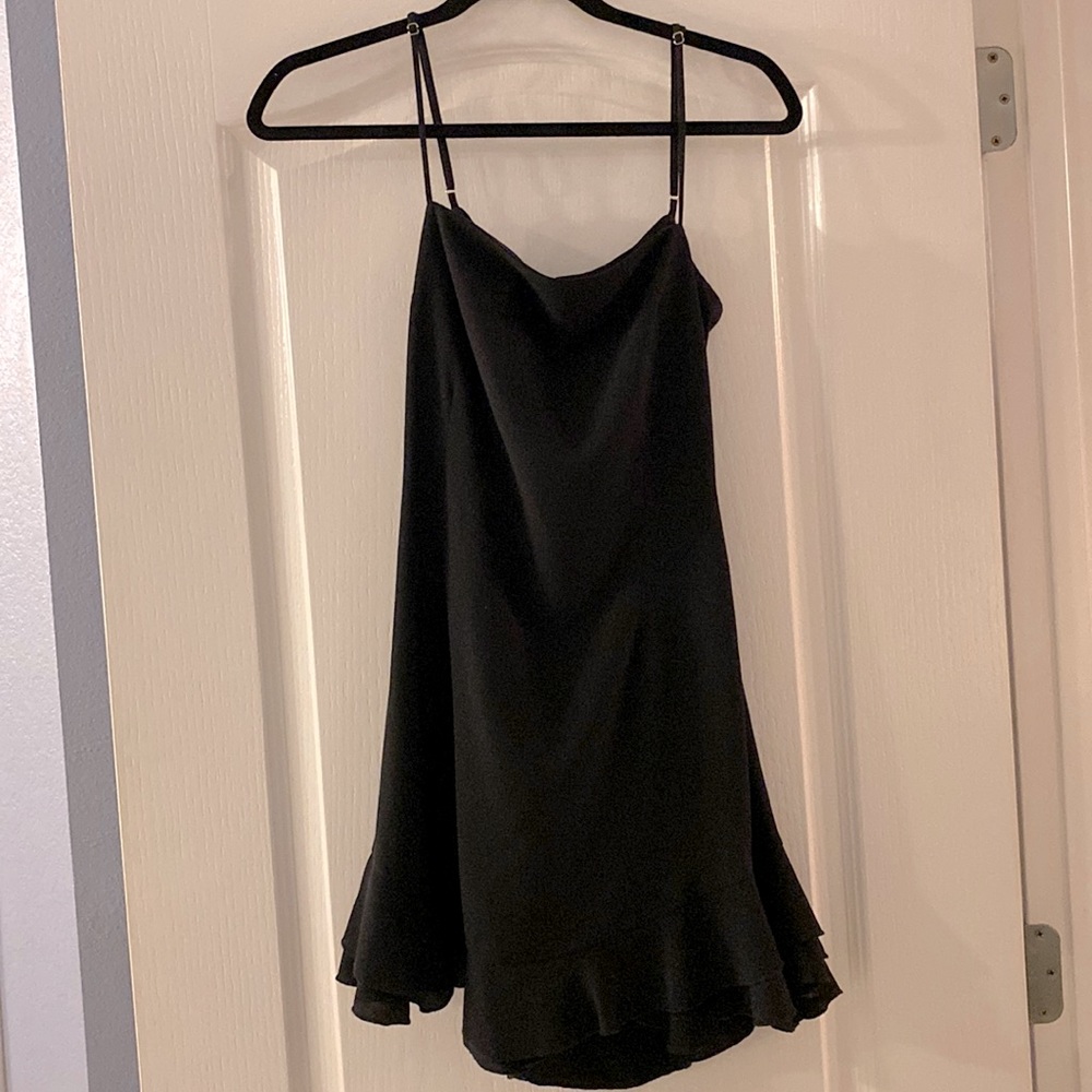 Lucy in the Sky black dress. Size L. Ruffle is n hem. Adjustable straps.